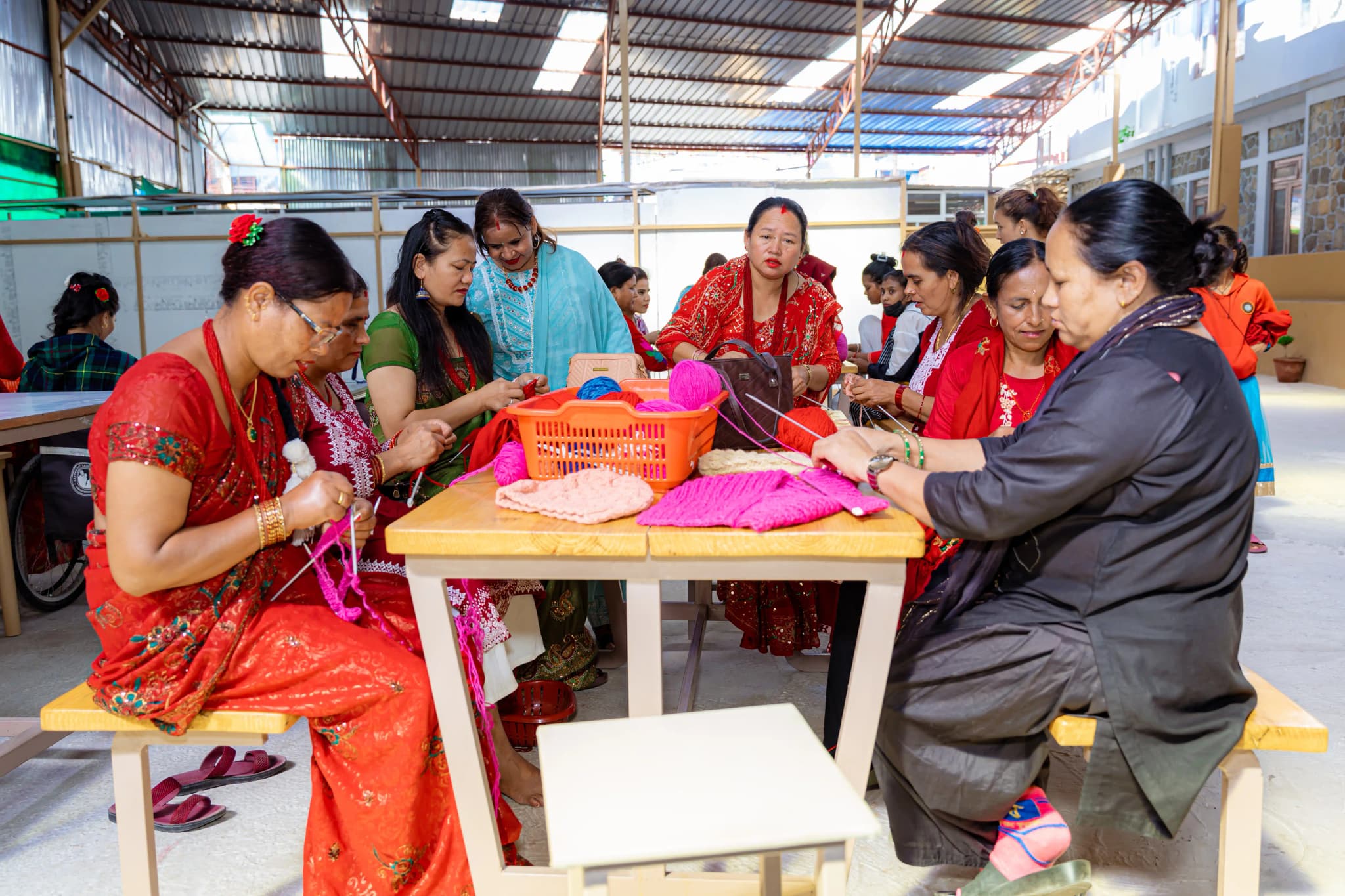 How does Yes Helping Hand empower the Community?